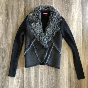 Faux fur jacket sweater with knit sleeves.